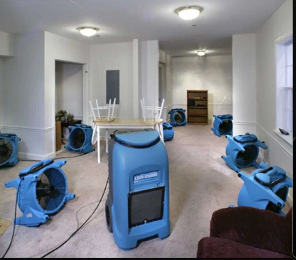 Air movers and dehumidifier setup for Water Extraction & Removal in Harvey